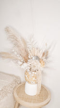 Load image into Gallery viewer, Fluffy dried floral arrangement in a large hand painted vase.
