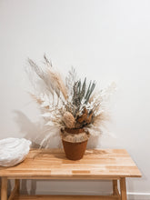 Load image into Gallery viewer, Space comet vase and native dried floral arrangement in rust burnt colours/