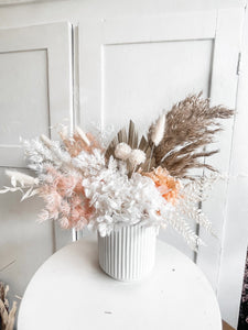 PEACHY raw and white potted floral arrangement