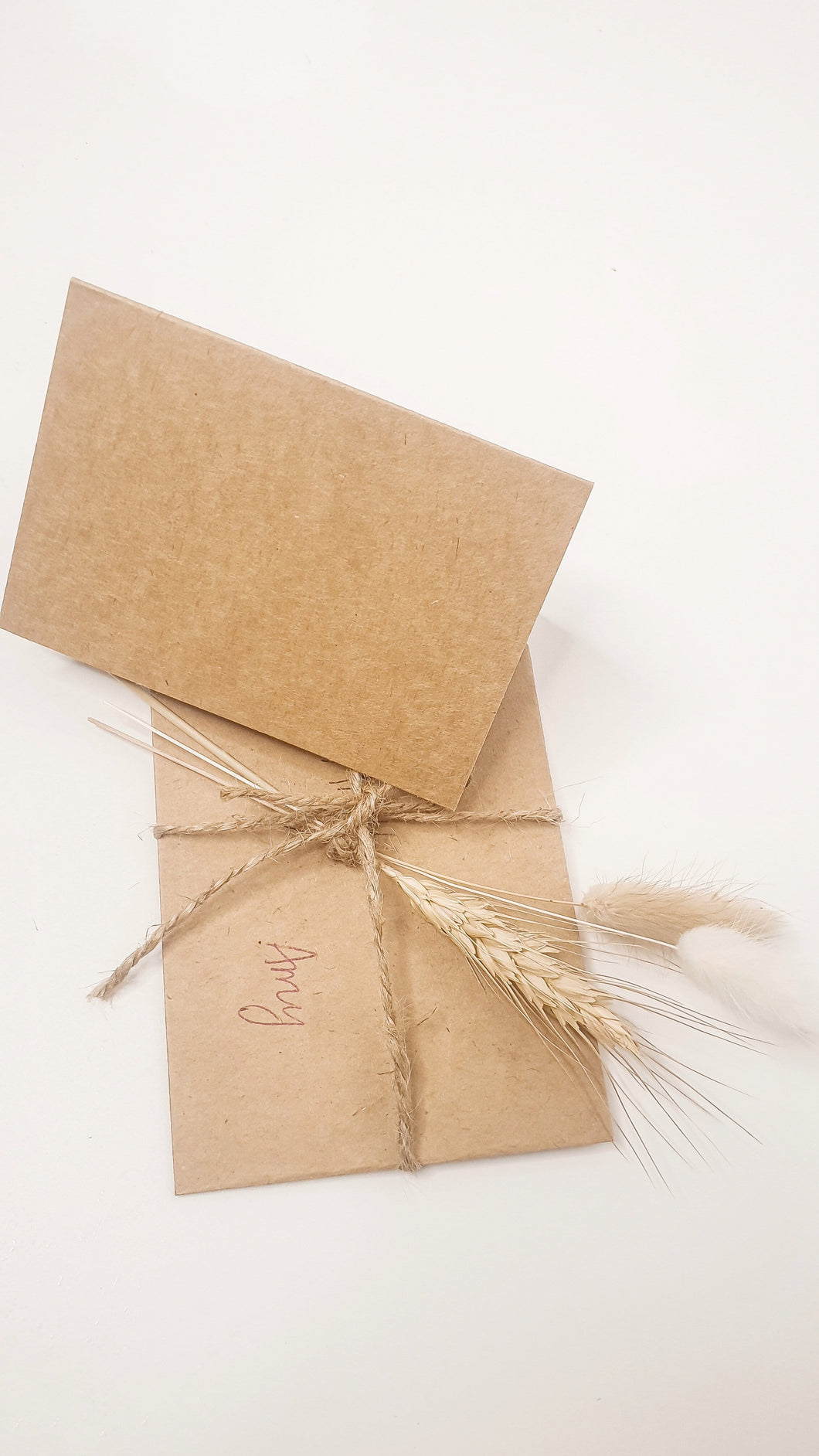 Card with message and envelope- including mini dried floral arrangement attached.
