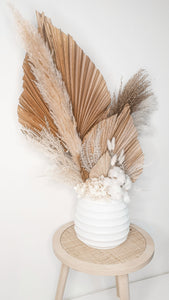 Oversized natural and white dried floral potted arrangement.- Moments