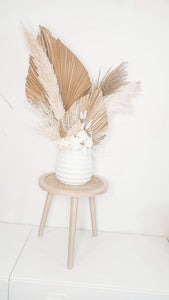 Oversized natural and white dried floral potted arrangement.- Moments