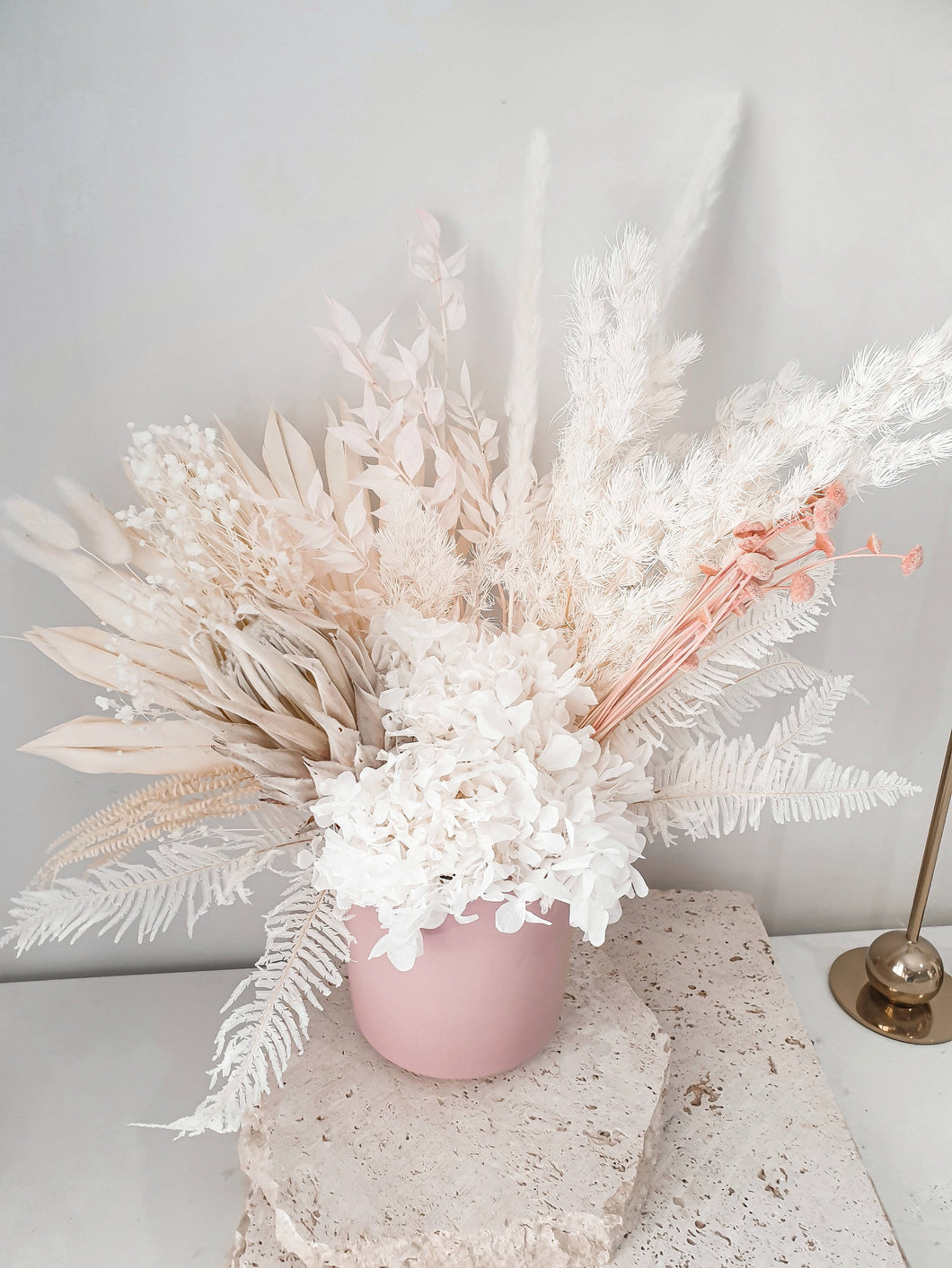 White and soft pink dried floral bunch in a vase to keep- summer pot